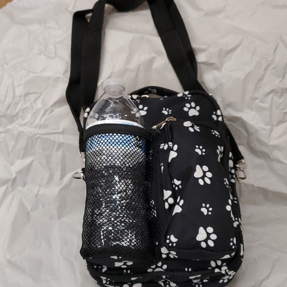 Hi Paw 🐾 prints crossbody bag, holds bottle w